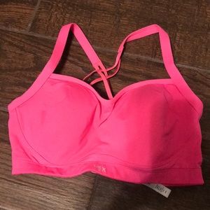 Pink Victoria’s Secret sports bra.